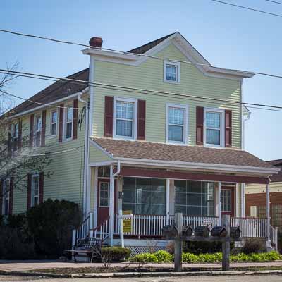 The Meat Market and Butcher Shop at 128 Old McHenry Road, a two-story frame building built by William Umbdenstock that originally housed a meat market and barber shop