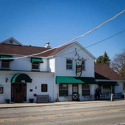 The Zimmer Tavern at the crossroads, a two-story building dating to circa 1849 and claimed to be Illinois' oldest continuously operating restaurant