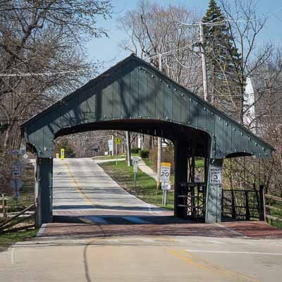 The Long Grove Covered Bridge over Buffalo Creek, built as a covering over a 1906 iron truss bridge in 1972, modeled on the Ashuelot, New Hampshire bridge